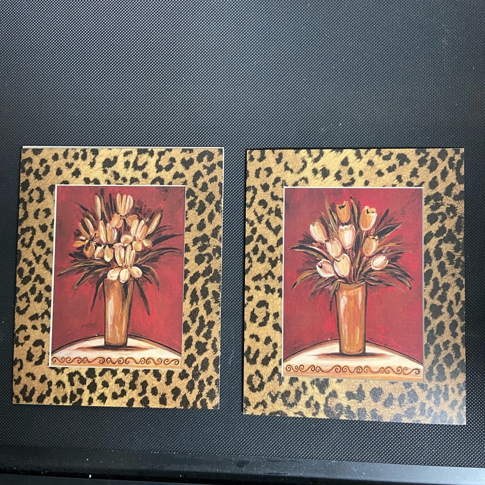 2 New animal print outside with floral design in middle.